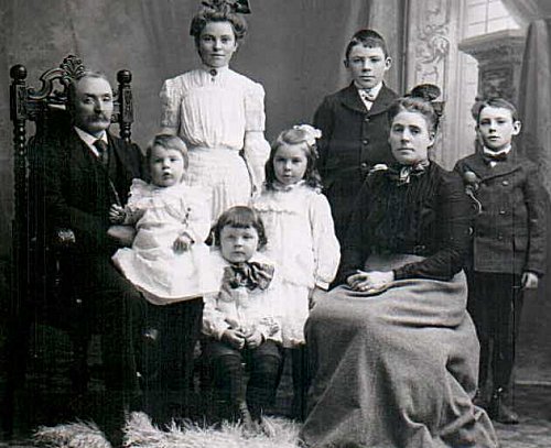 The family members are John Laughlin seated my grandfather